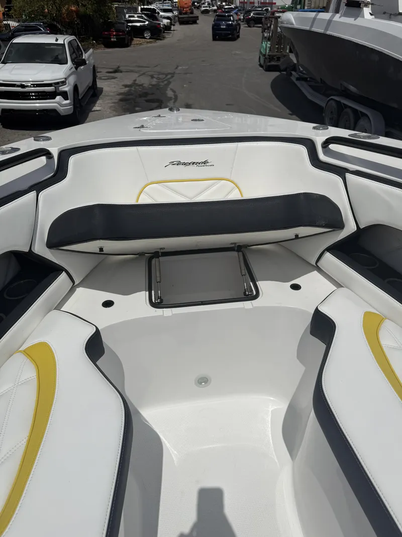 Slide: The Image of 2023 Renegade 38' Open boat interior with white and yellow seating. - 5