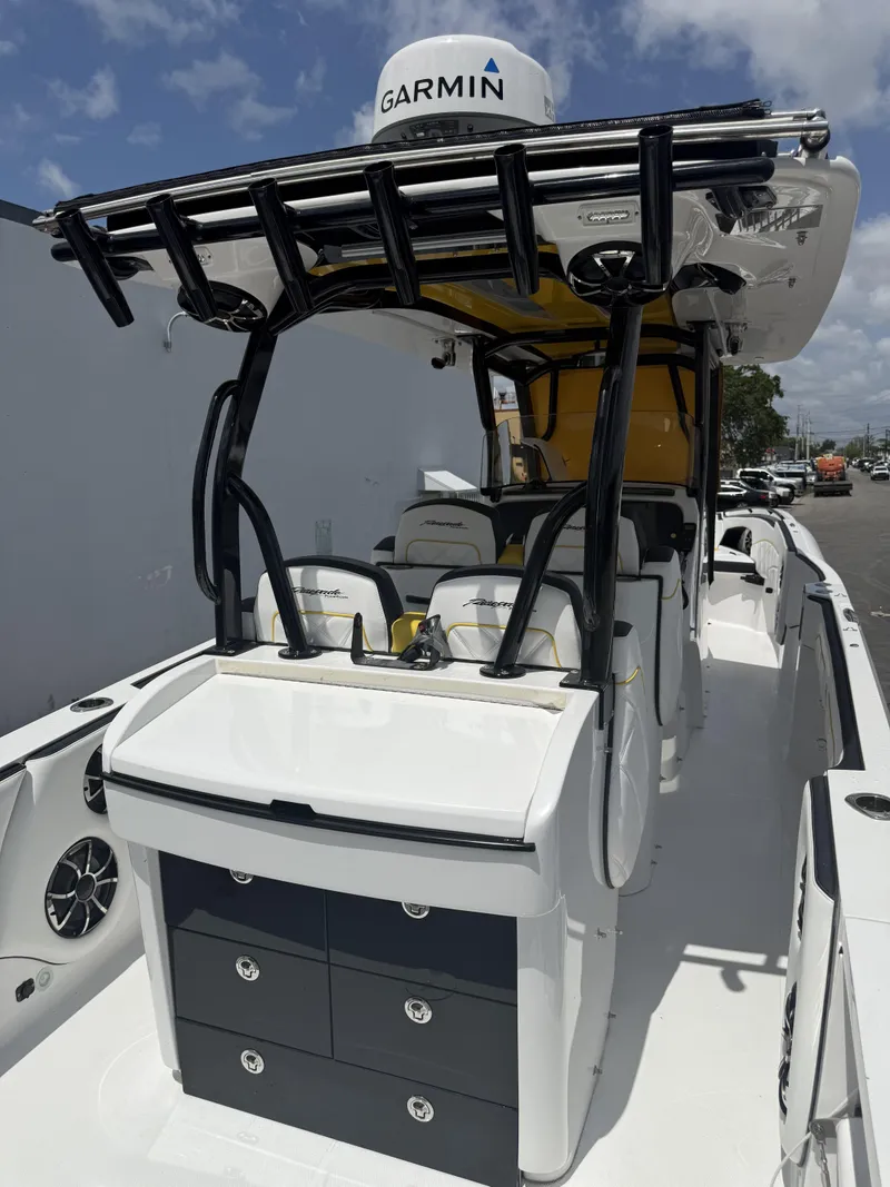 Slide: The Image of 2023 Renegade 38' Open boat with Garmin equipment, sleek design, and spacious seating. - 9