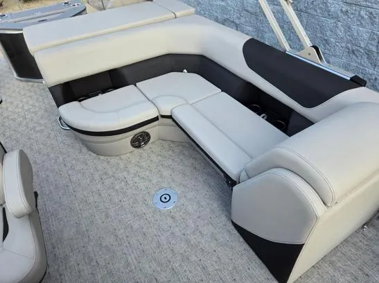 Slide: The Image of Luxurious seating on 2026 South Bay 224FCR LE pontoon boat, featuring plush upholstery. - 11
