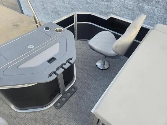 Slide: The Image of 2026 South Bay 224FCR LE boat interior with seating and storage compartments. - 14