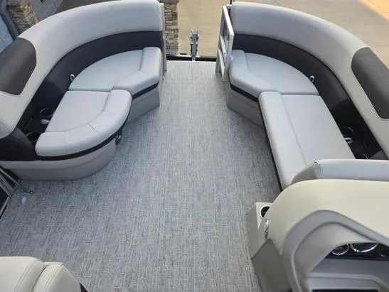Slide: The Image of 2026 South Bay 224FCR LE pontoon boat interior with gray and black seating. - 4