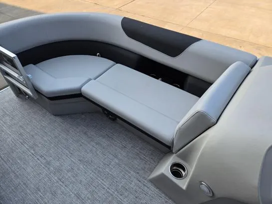 Slide: The Image of 2026 South Bay 224FCR LE boat interior with gray seating and cup holder. - 5