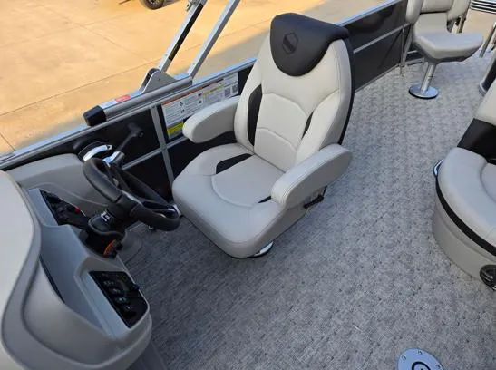 Slide: The Image of Captain's chair in 2026 South Bay 224FCR LE pontoon boat, featuring modern design and controls. - 7