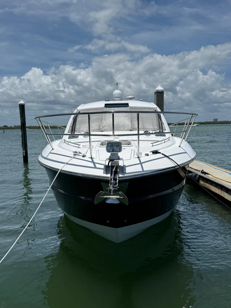 Slide: The Image of 2016 Monterey 360 Sport Coupe docked on a sunny day. - 3