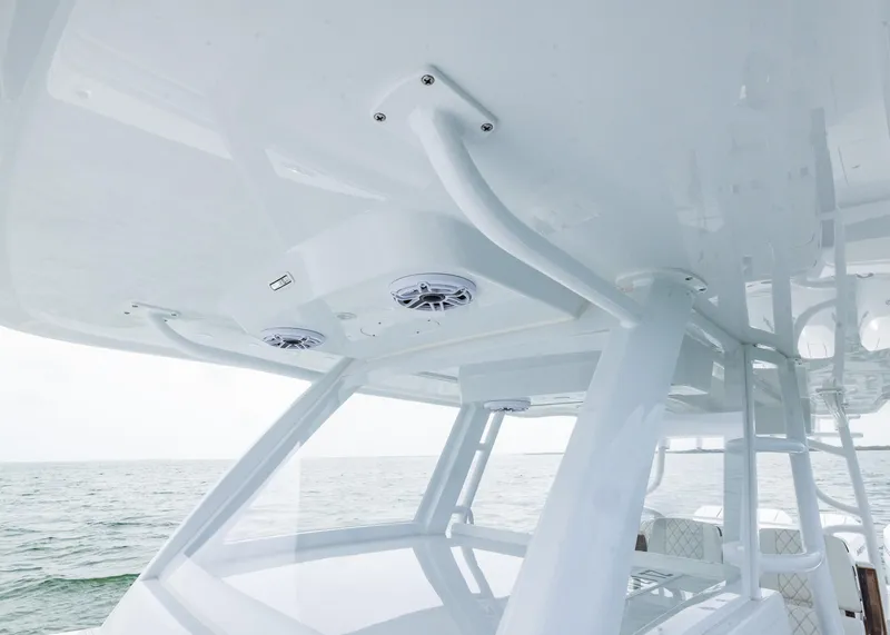 Slide: The Image of 2025 Invincible 43 Open Fisherman boat with sleek design and modern features on the water. - 13