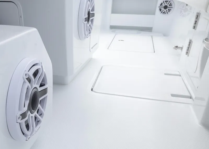 Slide: The Image of 2025 Invincible 43 Open Fisherman boat interior with speakers and storage compartments. - 30