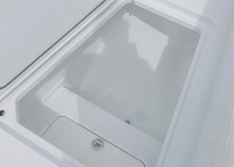 Slide: The Image of Open storage compartment on 2025 Invincible 43 Open Fisherman boat. - 34
