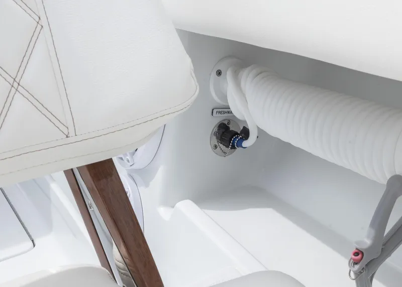Slide: The Image of Freshwater hose connection on 2025 Invincible 43 Open Fisherman boat interior. - 35