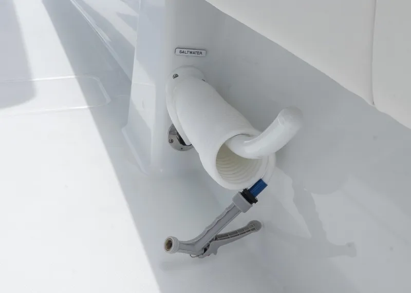 Slide: The Image of Saltwater hose on 2025 Invincible 43 Open Fisherman boat, neatly coiled and stored. - 42