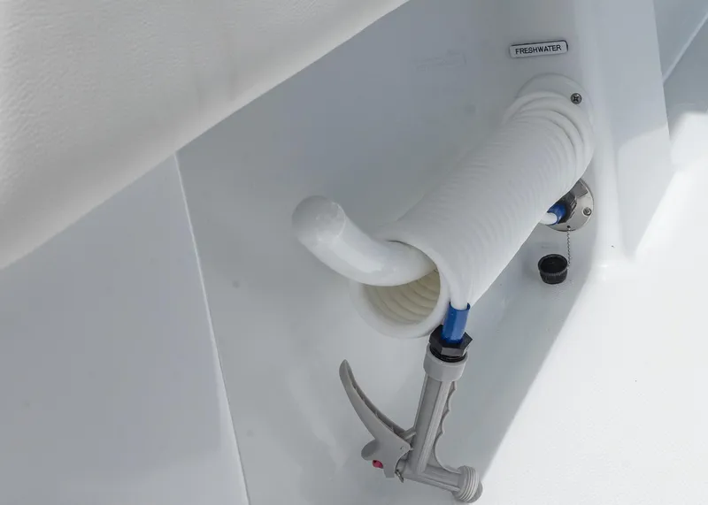 Slide: The Image of Freshwater hose system on 2025 Invincible 43 Open Fisherman boat. - 43