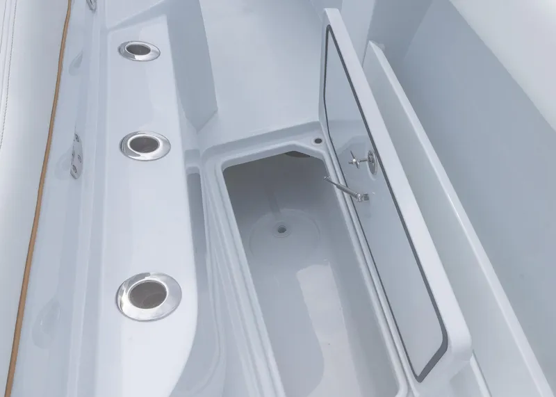 Slide: The Image of Open storage compartment on 2025 Invincible 43 Open Fisherman boat. - 44
