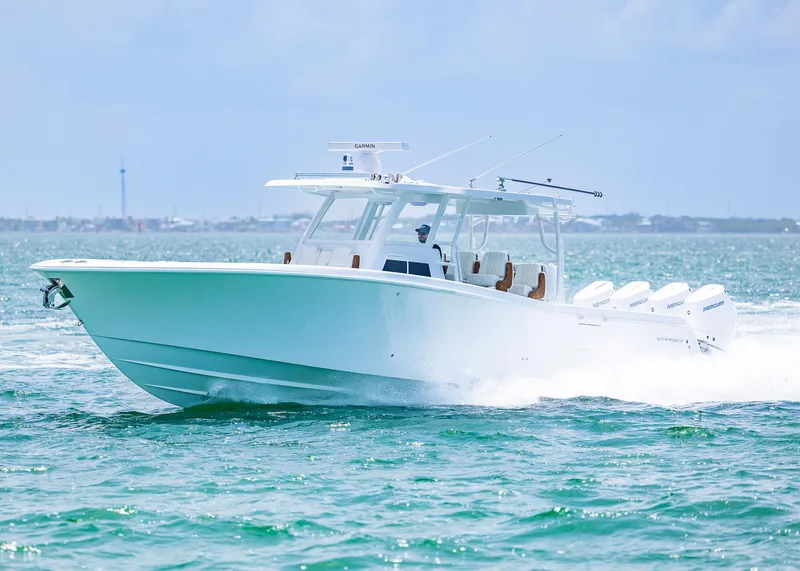 Slide: The Image of 2025 Invincible 43 Open Fisherman boat cruising on open water. - 47