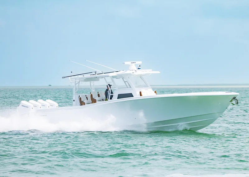 Slide: The Image of 2025 Invincible 43 Open Fisherman boat cruising on open water. - 48