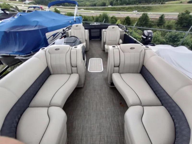 Slide: The Image of 2020 Barletta L23QC pontoon boat with spacious seating and modern design. - 2