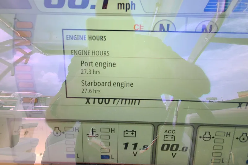 Slide: The Image of 2024 Robalo R317 Dual Console engine hours display, showing port and starboard engine usage. - 15