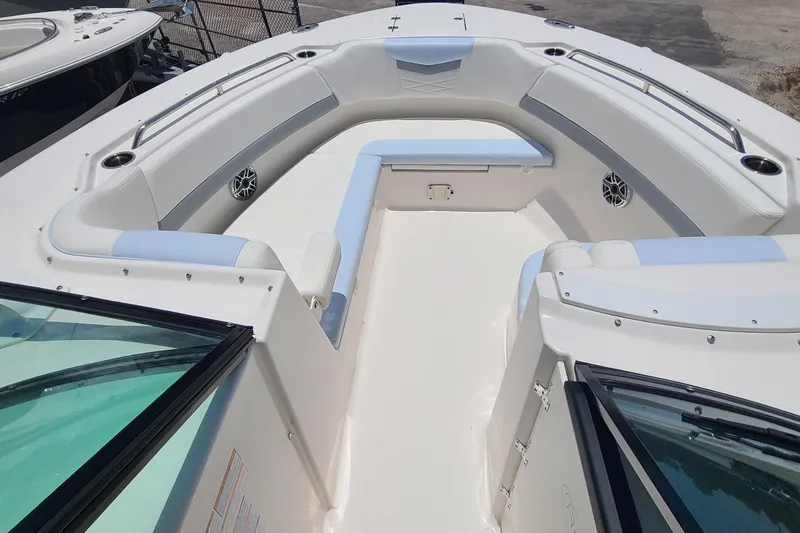 Slide: The Image of 2024 Robalo R317 Dual Console boat interior with spacious seating and modern design. - 8