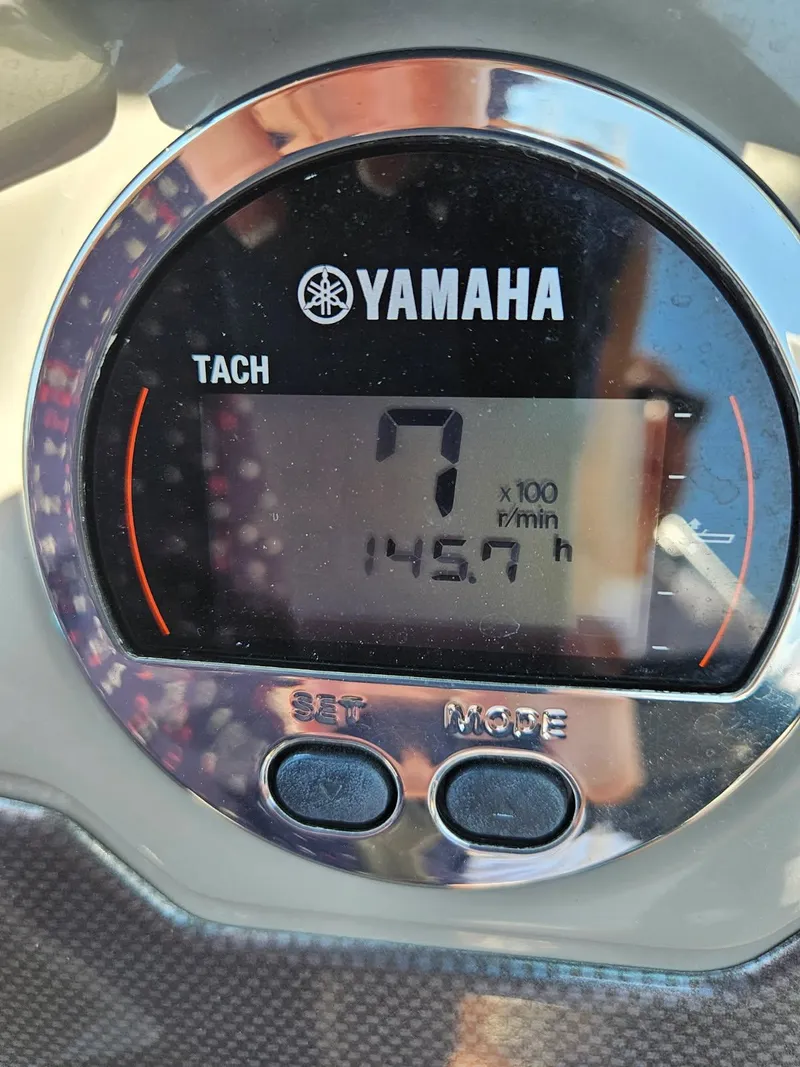 Slide: The Image of Yamaha tachometer displaying 145.7 hours on a 2018 Chaparral 21 H2O Sport OB. - 17