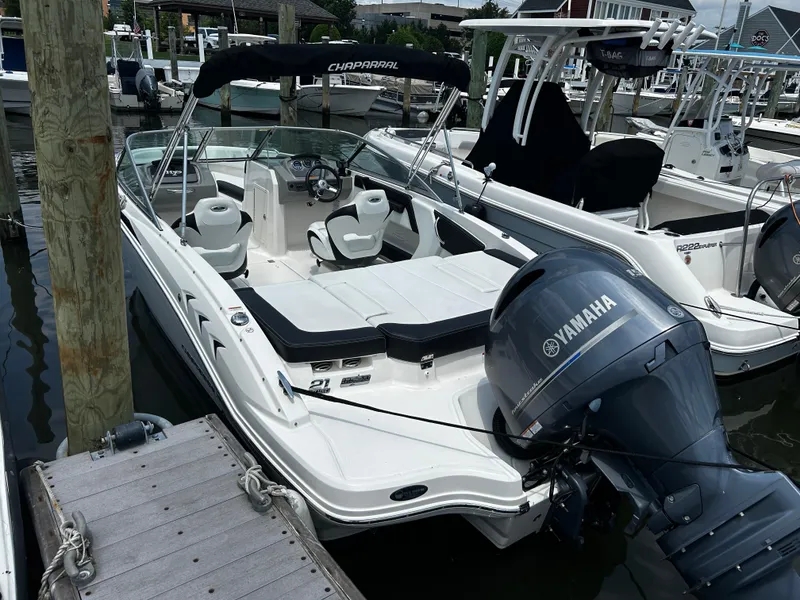 Slide: The Image of 2018 Chaparral 21 H2O Sport OB boat docked with Yamaha outboard motor. - 5