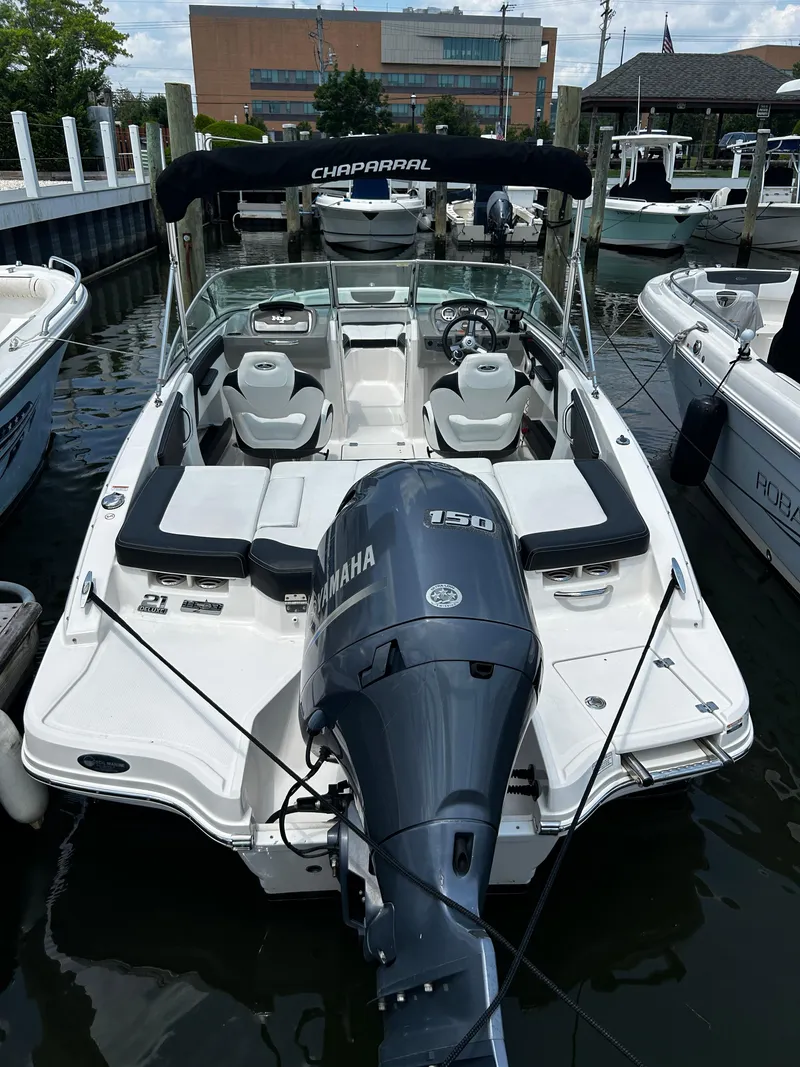 Slide: The Image of 2018 Chaparral 21 H2O Sport OB boat docked with Yamaha 150 outboard engine. - 8