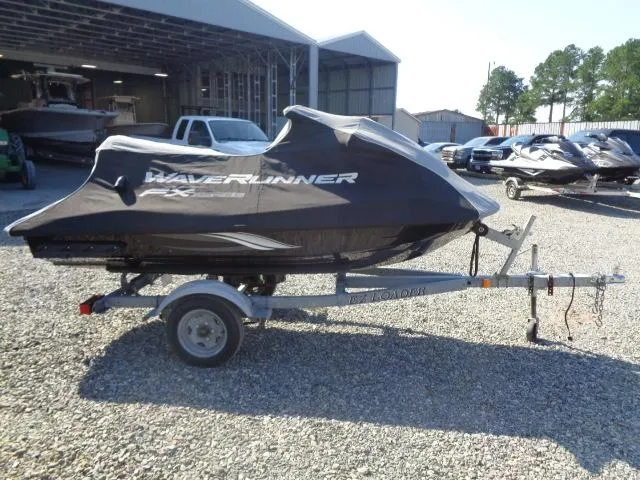 Slide: The Image of 2015 Yamaha WaveRunner FX Cruiser H/O on trailer, covered, parked outdoors. - 13