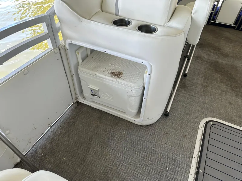 Slide: The Image of 2017 JC 25 Neptoon TT Sport boat interior with built-in cooler storage. - 24