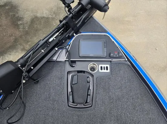 Slide: The Image of 2024 Ranger Z521R boat dashboard with navigation system and controls. - 3