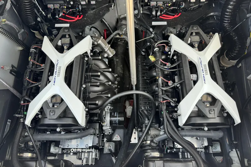 Slide: The Image of 2025 Yamaha Boats 252 FSH Sport engine compartment with dual high-output engines. - 25