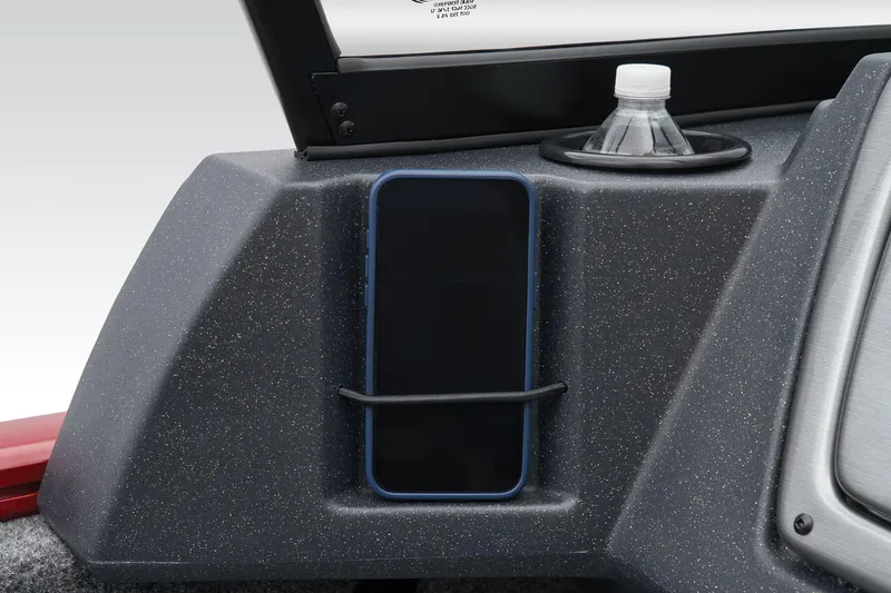 Slide: The Image of 2026 Tracker Pro Guide V-16 WT dashboard with phone holder and cup holder. - 18