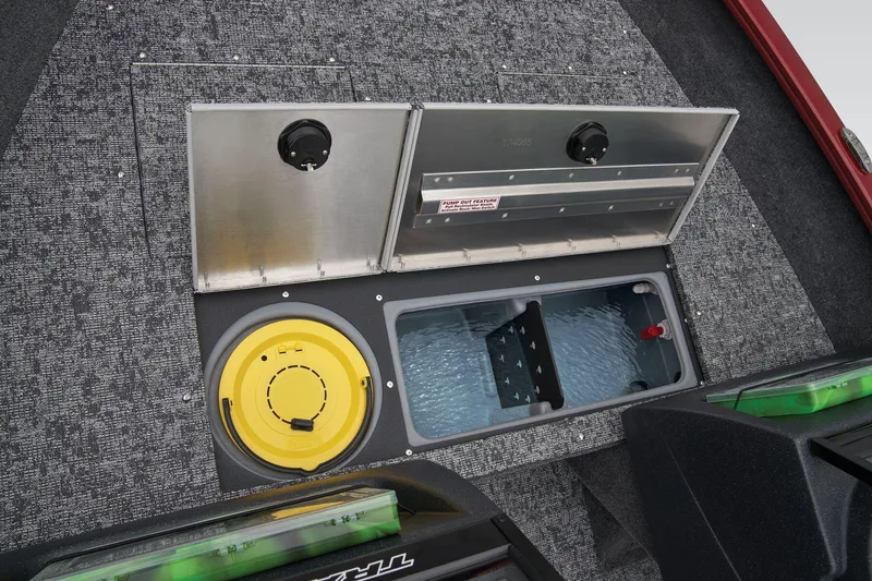 Slide: The Image of 2026 Tracker Pro Guide V-16 WT boat storage compartments with carpeted interior and utility features. - 22