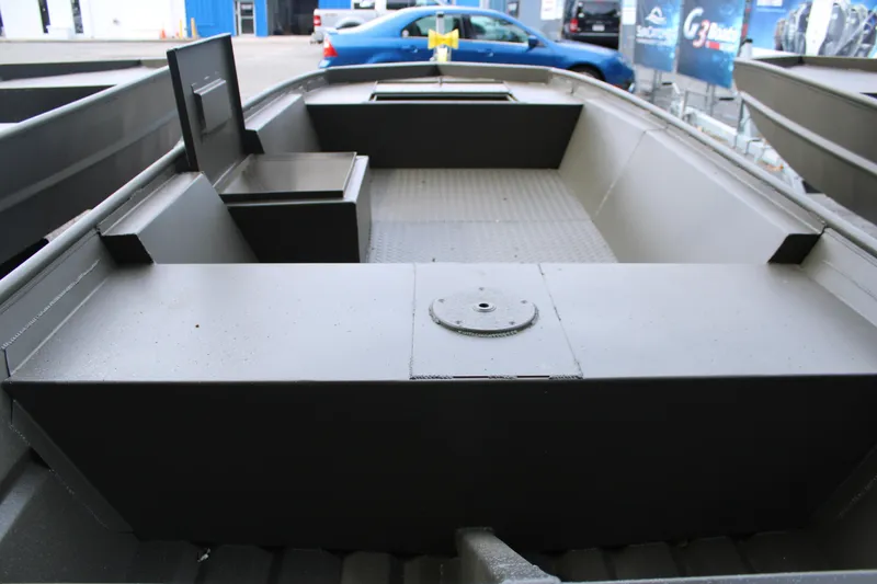 Slide: The Image of 2025 WeldBilt 1548V boat interior with seating and storage compartments. - 4