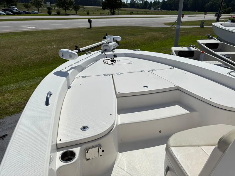 Slide: The Image of 2017 Robalo 226 Cayman boat deck with seating and storage compartments. - 7