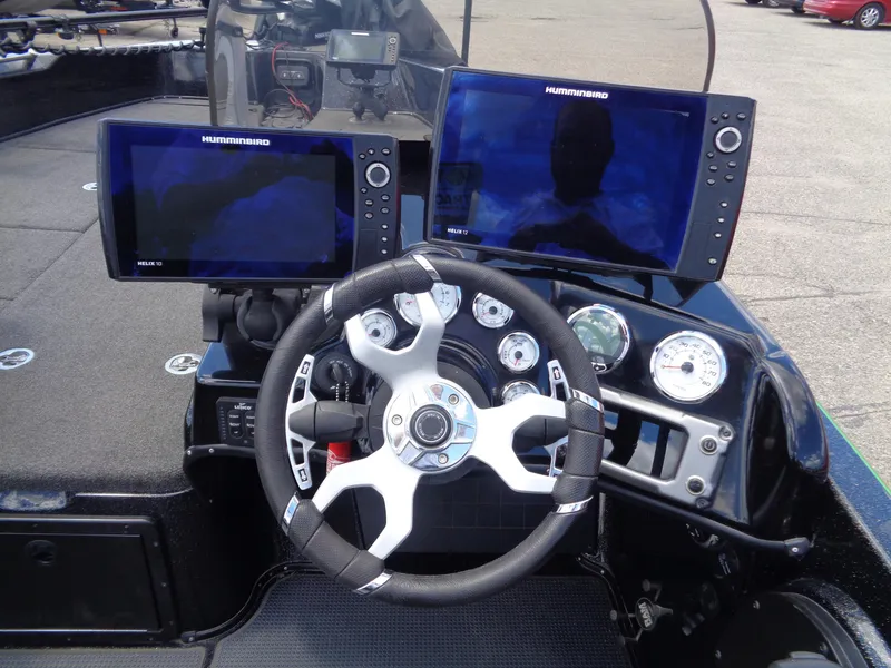 Slide: The Image of Steering console of 2022 Nitro ZV21 boat with dual Humminbird displays. - 15