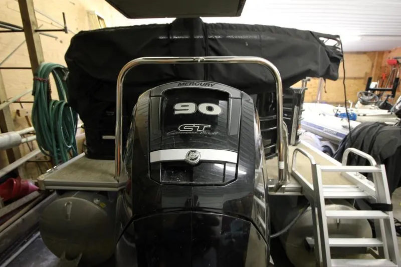 Slide: The Image of 2017 South Bay 222 CR boat with Mercury 90 CT outboard engine in storage. - 16