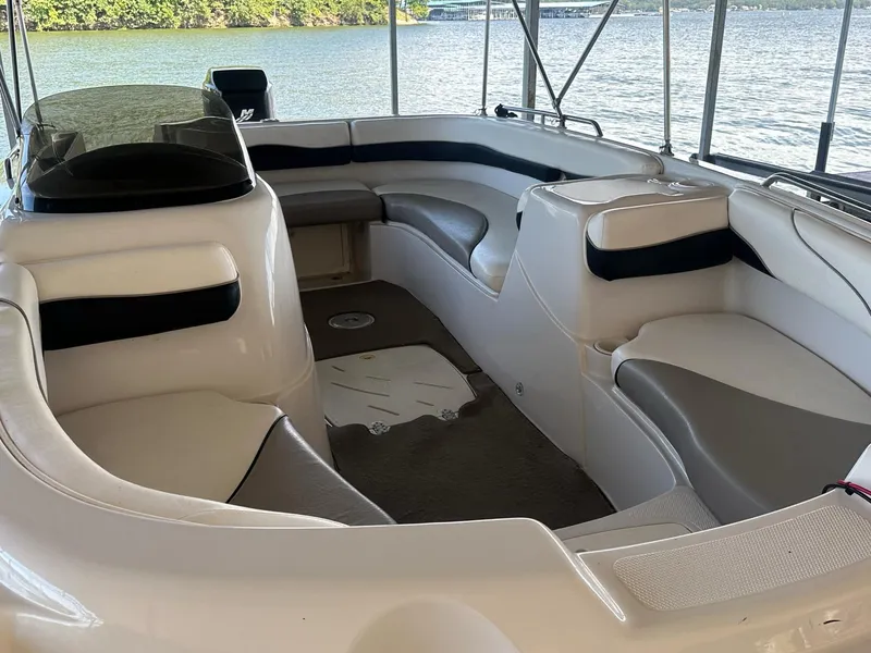 Slide: The Image of Interior of a 2005 Tahoe 195 OB boat with spacious seating and lake view. - 33