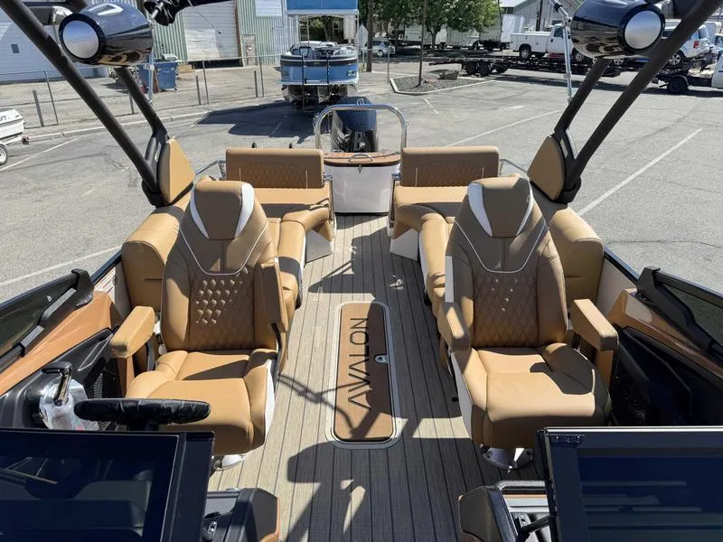 Slide: The Image of Luxurious 2025 Avalon 2585 27-3 Excalibur LTD QL boat interior with plush seating. - 20