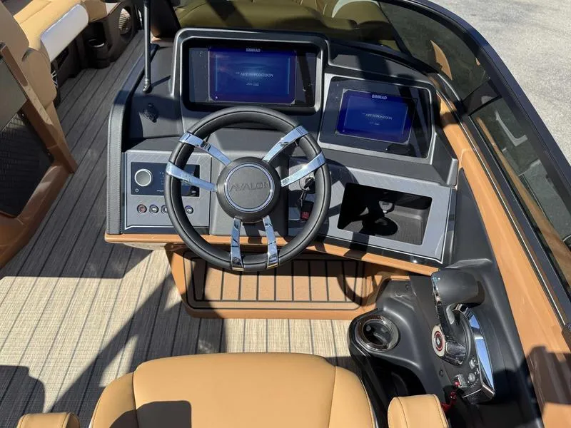 Slide: The Image of 2025 Avalon 2585 27-3 Excalibur LTD QL boat dashboard with modern controls and displays. - 21