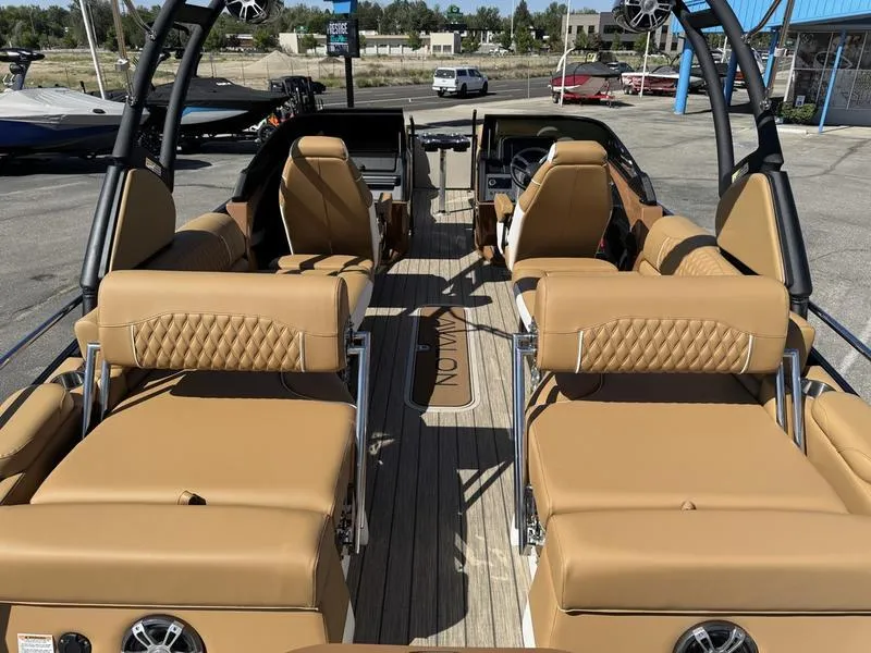 Slide: The Image of Luxurious 2025 Avalon 2585 27-3 Excalibur LTD QL boat interior with tan seating and modern design. - 7