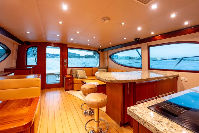 Slide: The Image of Luxurious interior of 2010 Hatteras 60 Convertible yacht with elegant wood and granite finishes. - 27