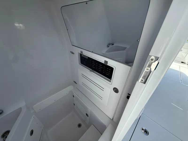 Slide: The Image of Interior of 2026 Jupiter 34 boat, featuring sleek control panel and modern design. - 7