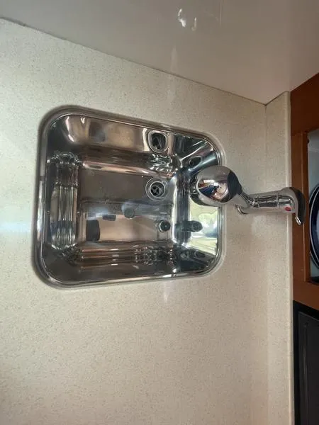 Slide: The Image of Stainless steel sink with faucet in 2006 Back Cove 29 boat. - 16