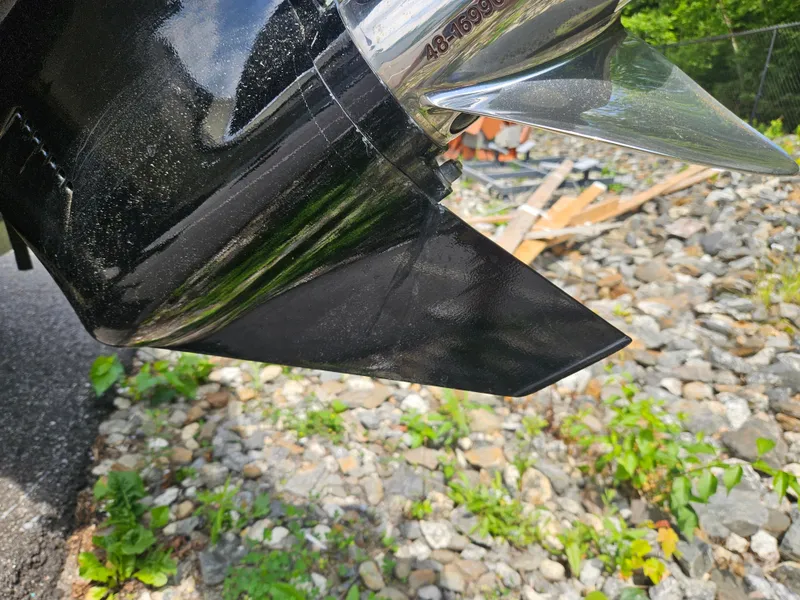 Slide: The Image of Close-up of a 2008 Boston Whaler 170 Montauk boat propeller outdoors. - 17