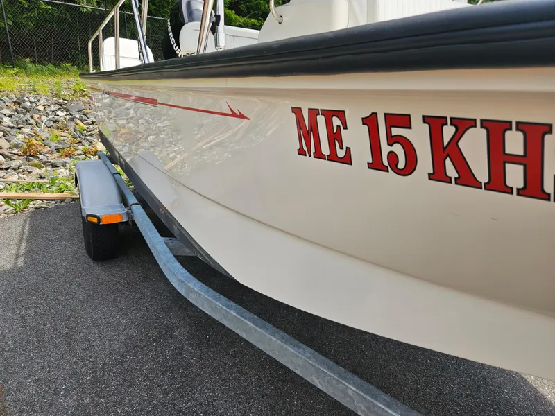 Slide: The Image of 2008 Boston Whaler 170 Montauk on trailer, registration ME 15 KH visible. - 21