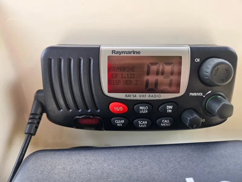Slide: The Image of Raymarine Ray54 VHF radio on 2008 Boston Whaler 170 Montauk boat dashboard. - 28