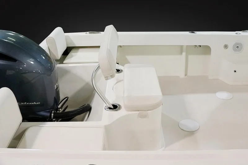 Slide: The Image of Manufacturer Provided Image: 2020 Parker 2120 Sport Cabin boat interior with seating and outboard motor. - 8