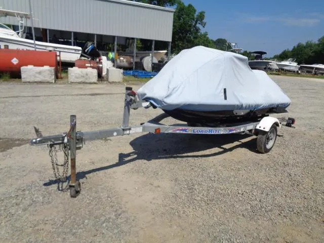 Slide: The Image of 2007 Yamaha WaveRunner FX HO on trailer, covered, in outdoor storage area. - 11