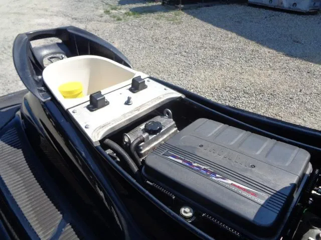 Slide: The Image of 2007 Yamaha WaveRunner FX HO engine compartment, showcasing internal components and storage area. - 4