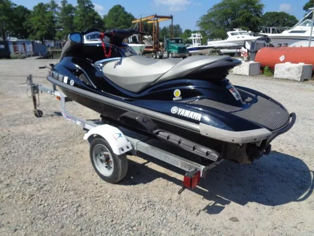 Slide: The Image of 2007 Yamaha WaveRunner FX HO on trailer, parked outdoors on gravel. - 6