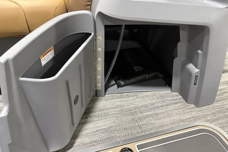 Slide: The Image of Open storage compartment in 2025 Godfrey Sweetwater 2286 SFL iMPACT pontoon boat. - 16