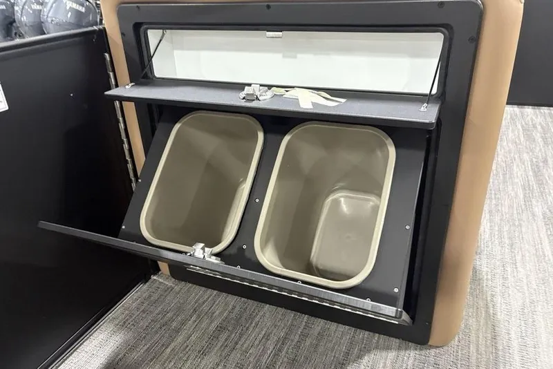 Slide: The Image of Storage compartment with dual bins in 2025 Godfrey Sweetwater 2286 SFL iMPACT Package boat. - 18