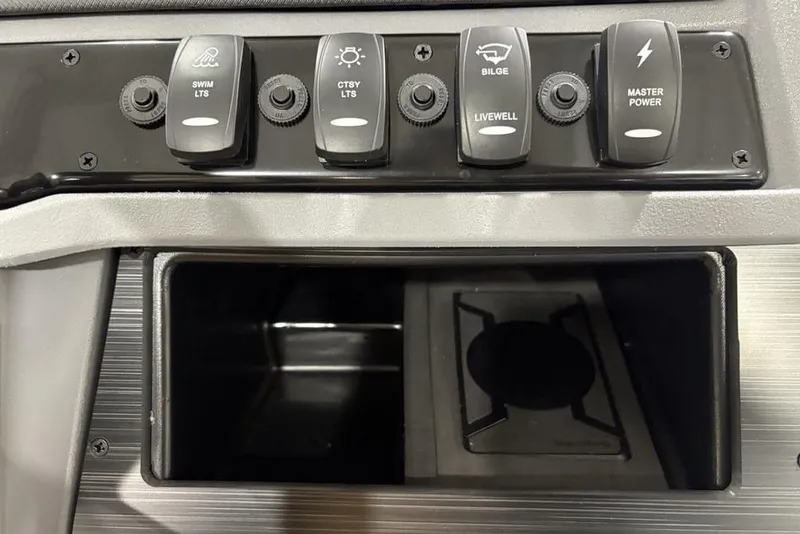 Slide: The Image of Control panel of 2025 Godfrey Sweetwater 2286 SFL iMPACT boat with labeled switches. - 22